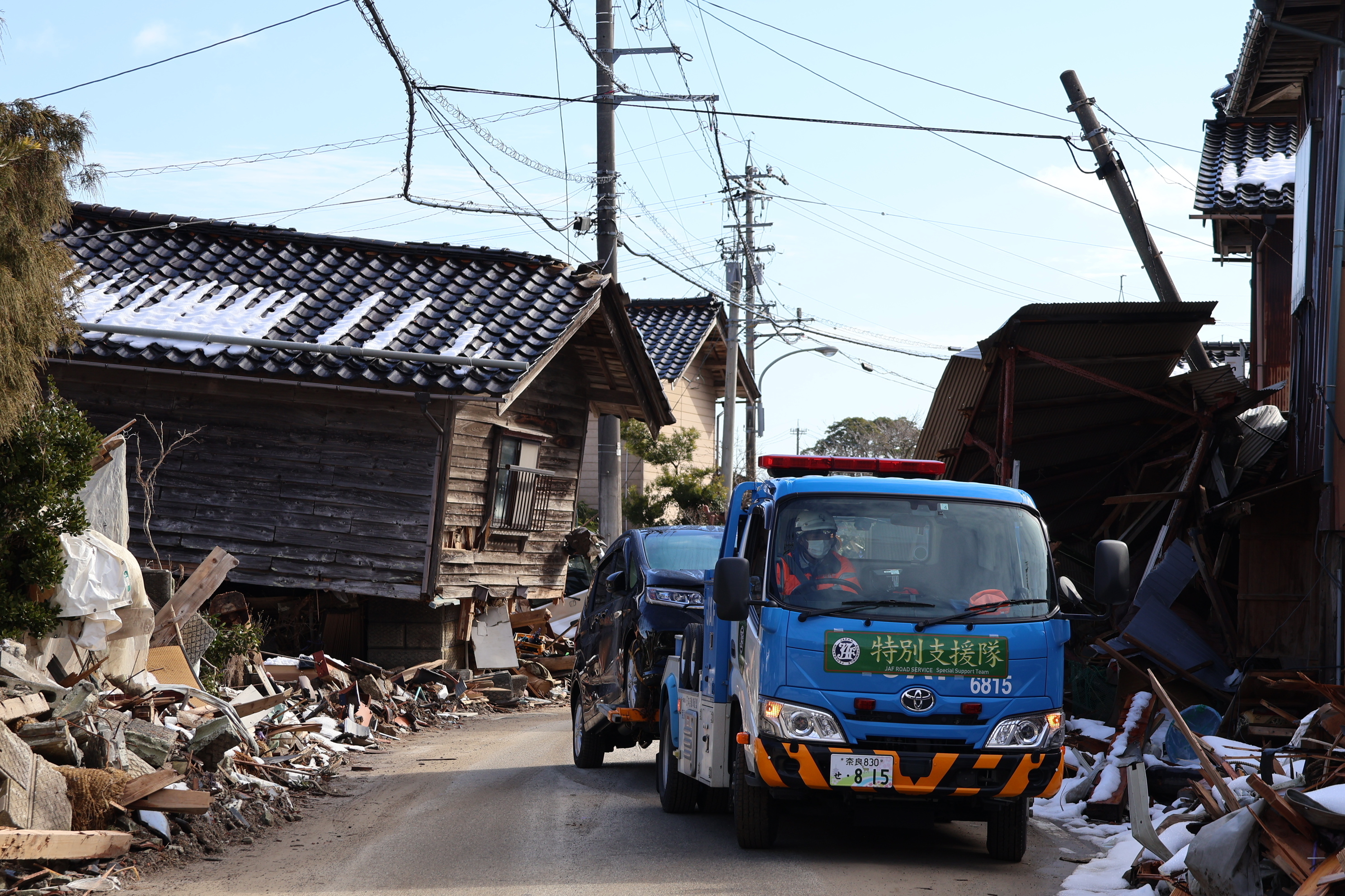 写真：2024年能登半島地震（特別支援隊による車両搬送）